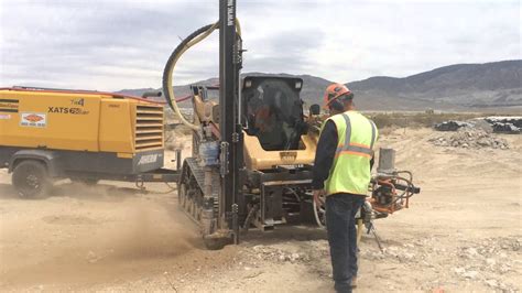 youtuberhino skid steer drills|deep hole drilling skid steer.